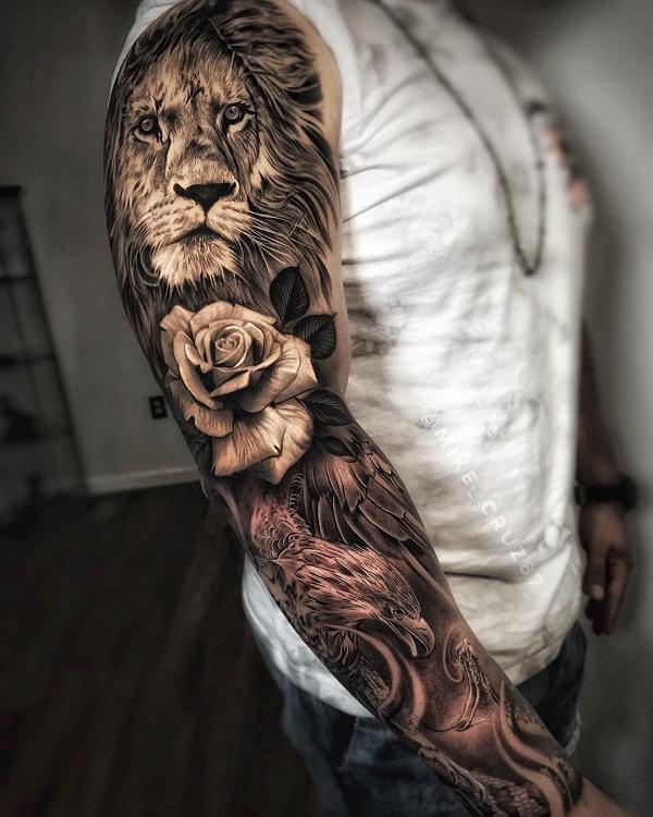 Lion rose and bird full sleeve tattoo