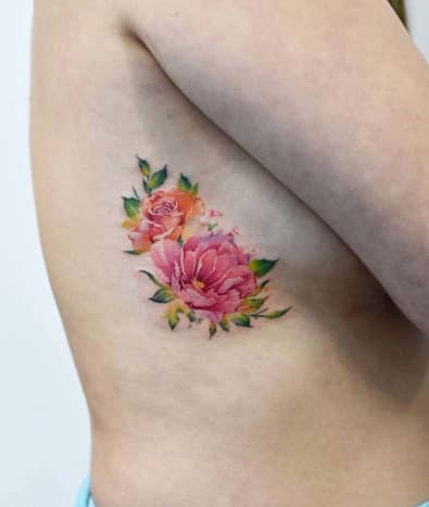 Wir sind Hals über Kopf für dieses süße Aquarelltattoo.