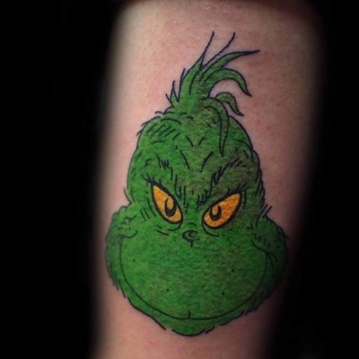 Grinch-Kopf-Arm-Tattoo-Designs-für-Jungs