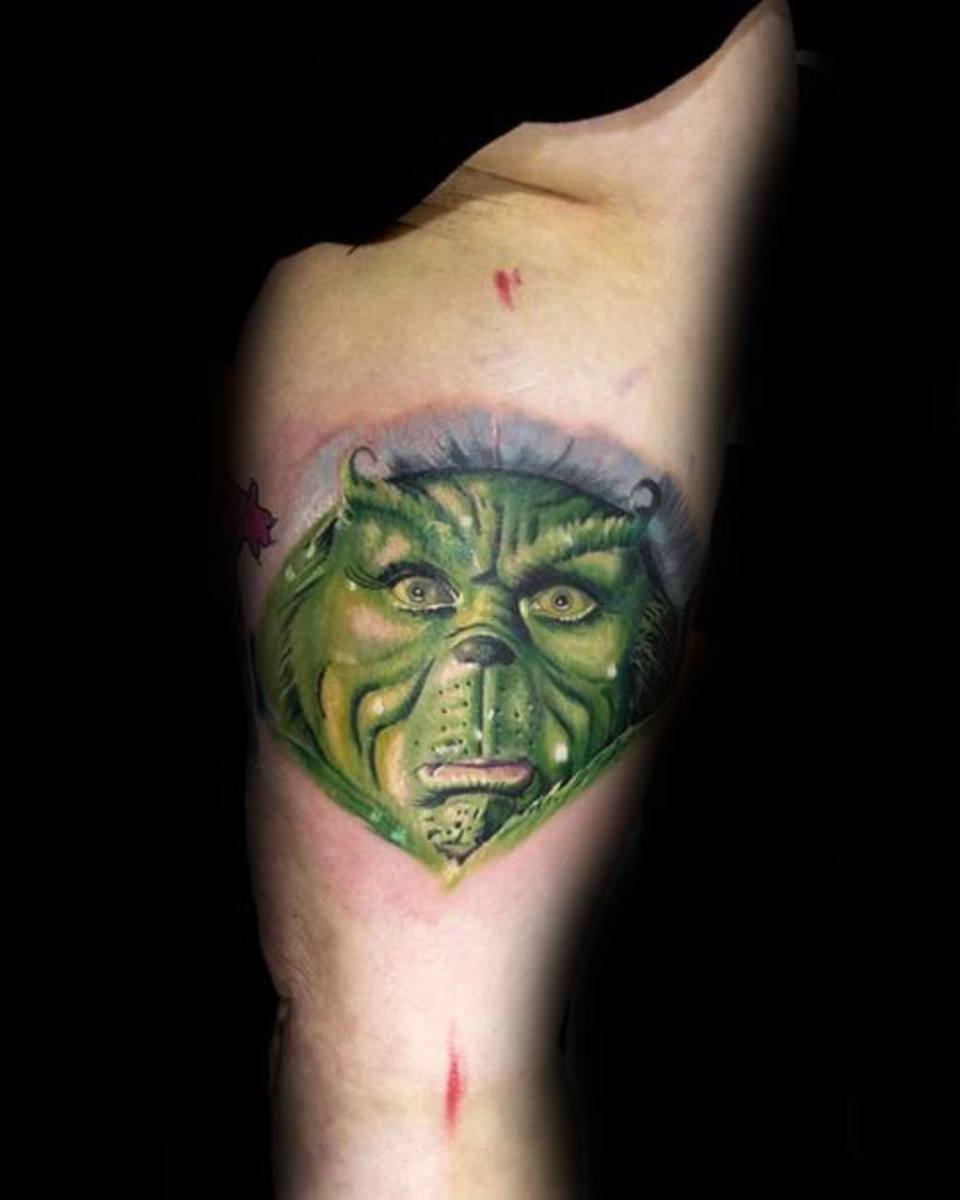 Ripped-Skin-Grinch-Tattoo