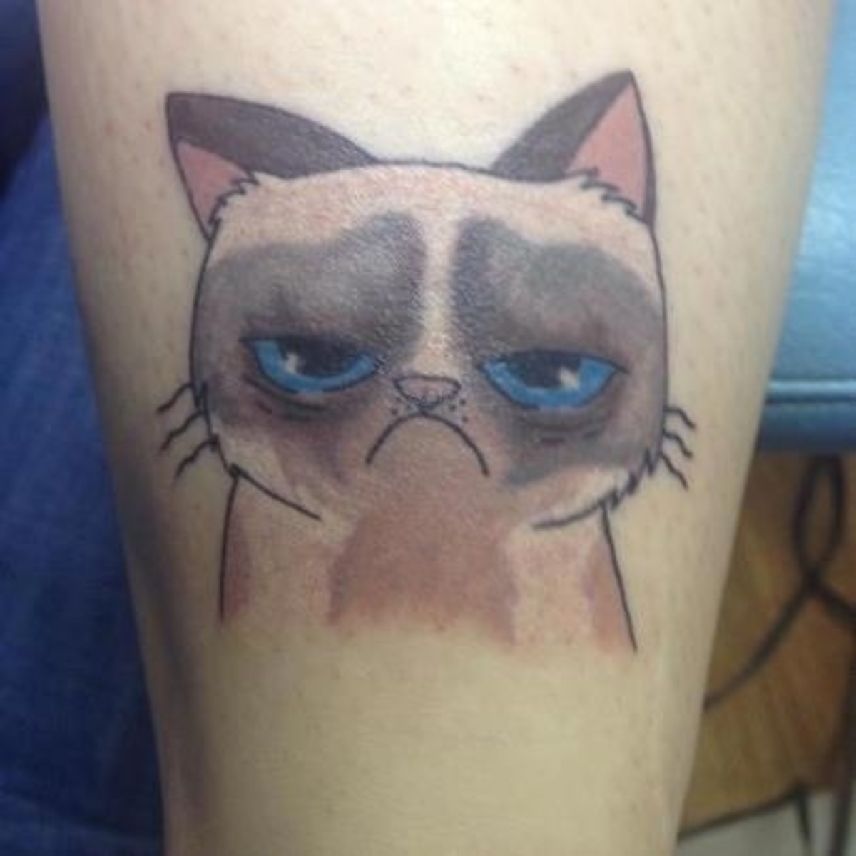 Blau-Augen-Mürrische-Katze-Tattoo