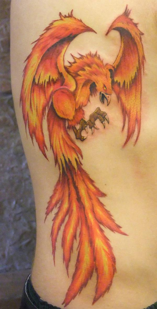 leuchtendes Phoenix Rippen Tattoo