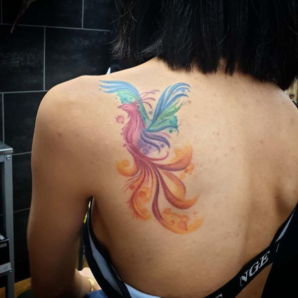 Watercolor Phoenix tat on back for women