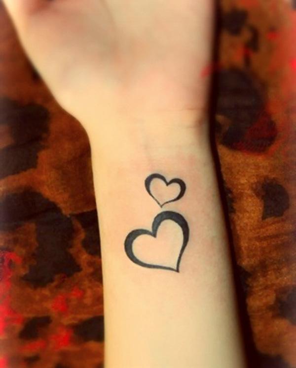 Malé srdce symboly tetování