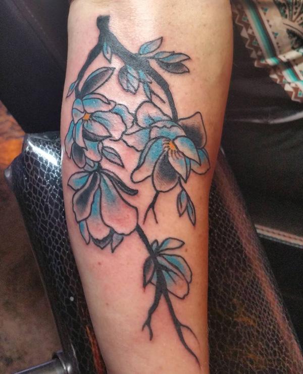 Magnolie Tattoo auf Verzögerung