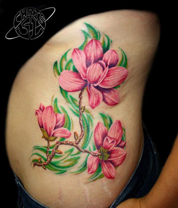 Tattoo mit rosa Magnolienblume