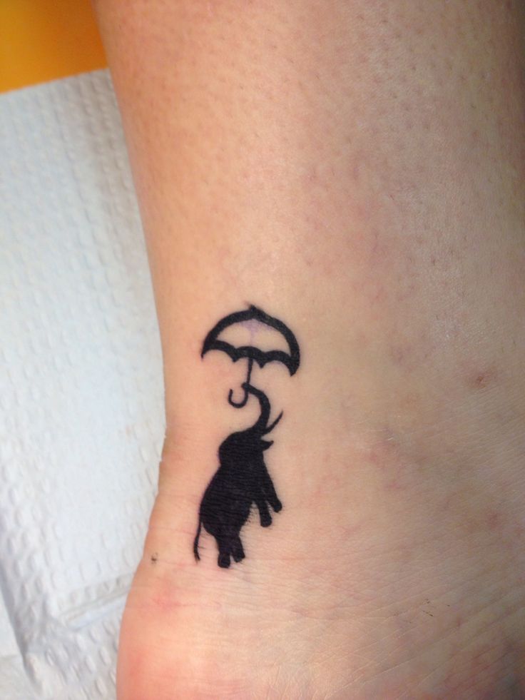 50 Original-Elefanten-Tattoo-Designs. # 7 ist Genie.