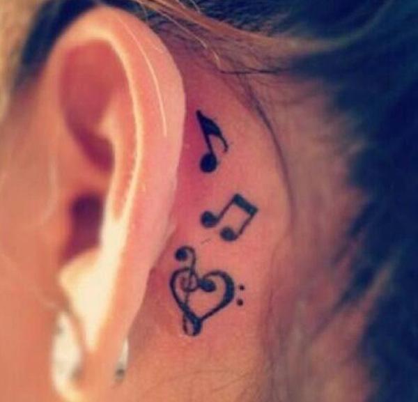 55 Musik Tattoo hinter dem Ohr