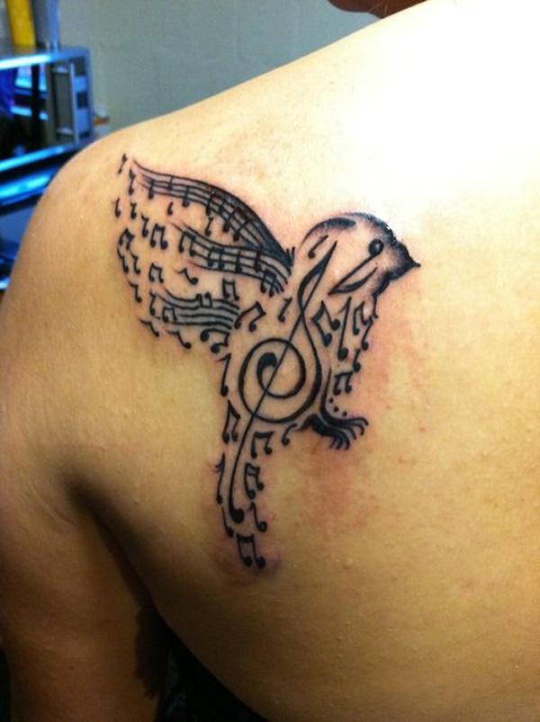 32 Musik Vogel Tattoo