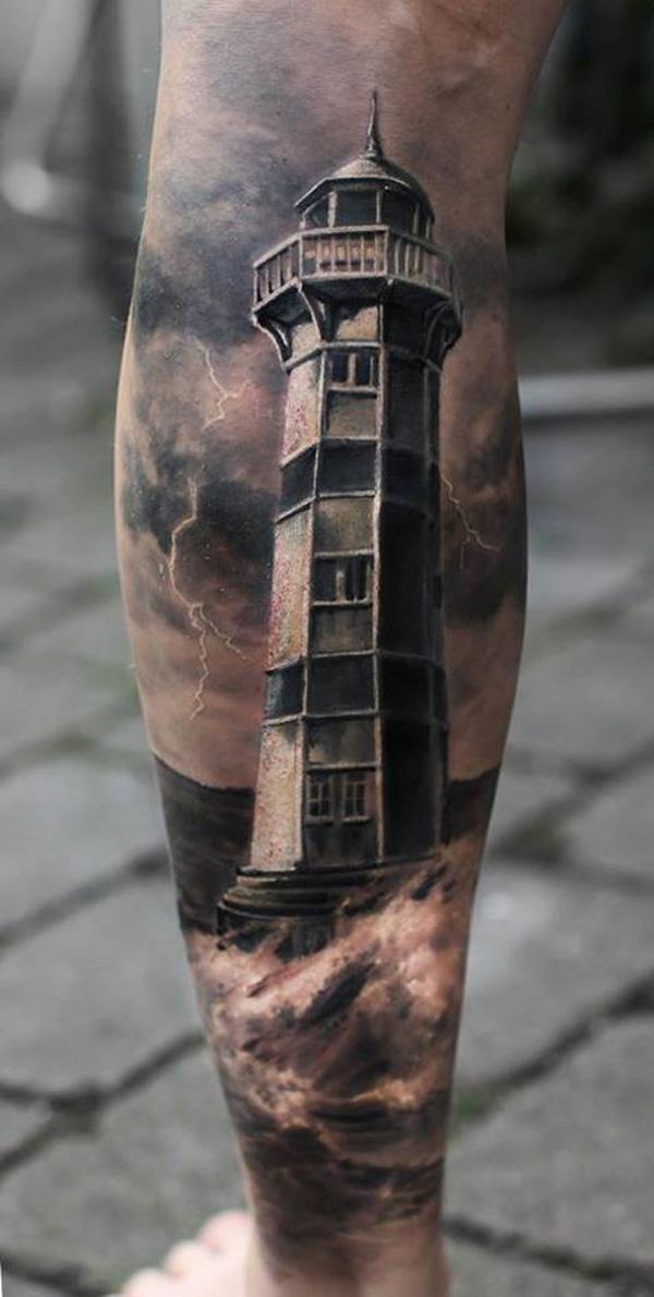 Schwarzweißes Leuchtturm Tattoo an der Wade