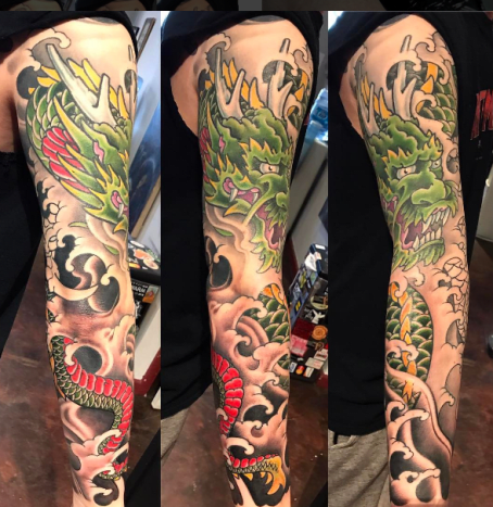 drei Schüsse von Drachen Tattoo am Arm