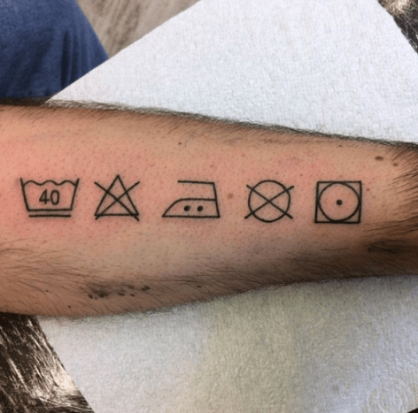 Tattoo mit Wäschepflegesymbolen