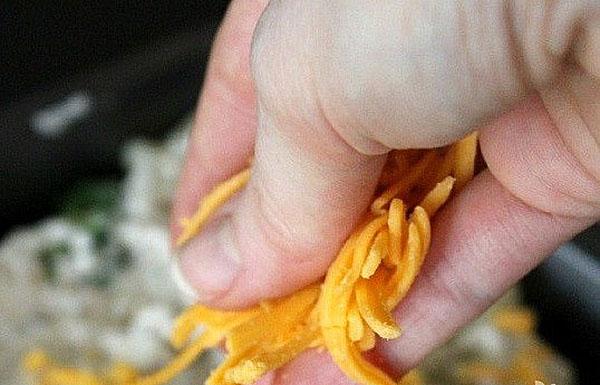 espolvorear con queso rallado