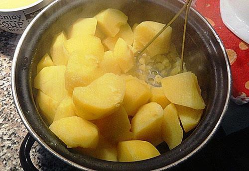 hervir y hacer puré de patatas