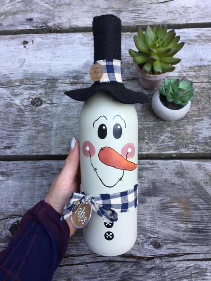 bonhomme de neige d'une bouteille de vin