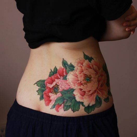 Lower Back Tattoos, um das Stigma des Landstreicherstempels zu zerstören