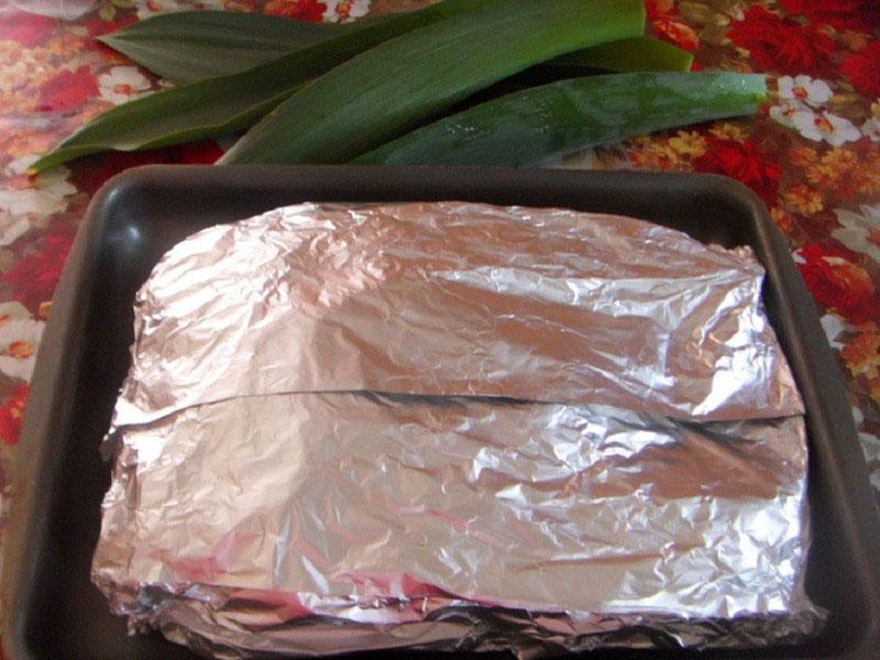 envuelva la carne en papel de aluminio