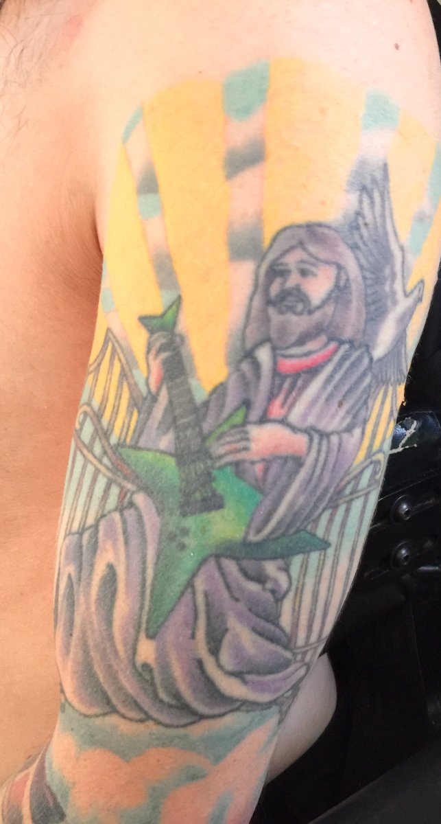 Oxleys Jesus Tattoo, inspiriert von Dimebag Darrell von Pantera.