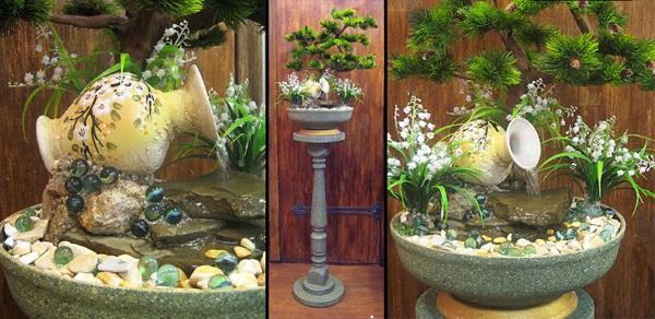 Composición de bonsai y fuente interior.