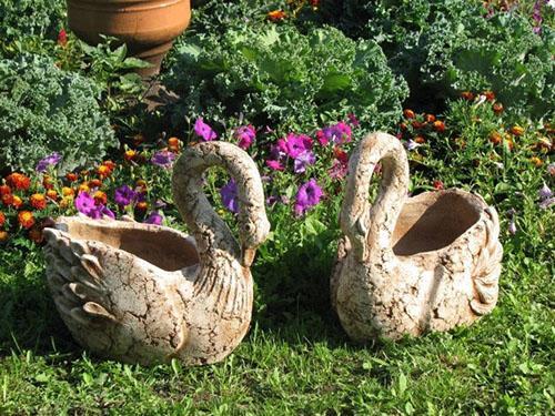 mini parterre de fleurs en forme d'oiseaux