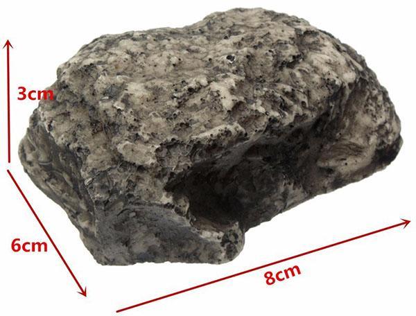 les dimensions extérieures de la pierre de cache