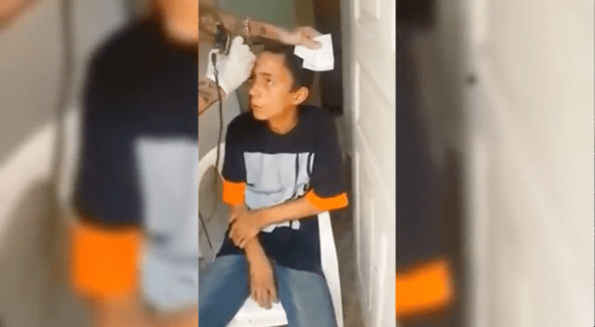 Je trest pro zločin příliš přísný? Video ukazuje vyděšeného teenagera, jak sedí na židli, zatímco tetování uráží chlapce, než se dopustí toho, co policie v Sao Paolu označuje jako