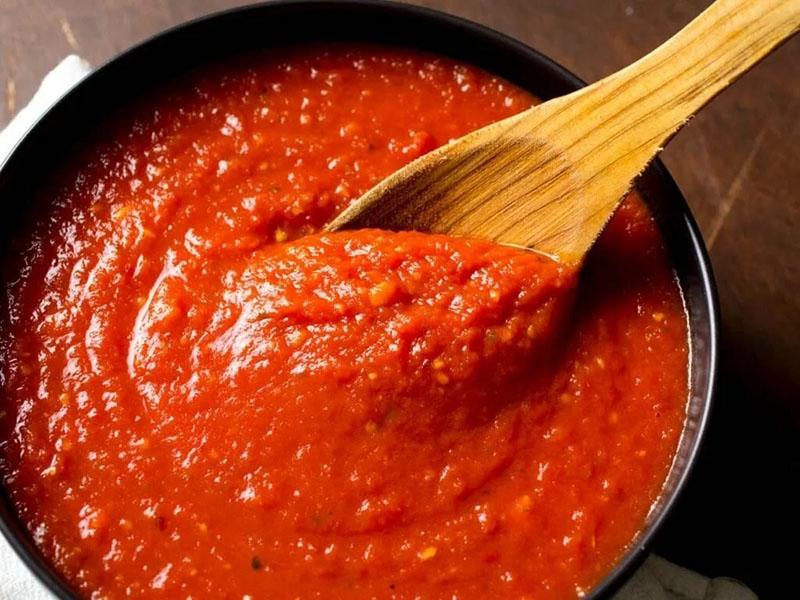 faire bouillir la pâte de tomate